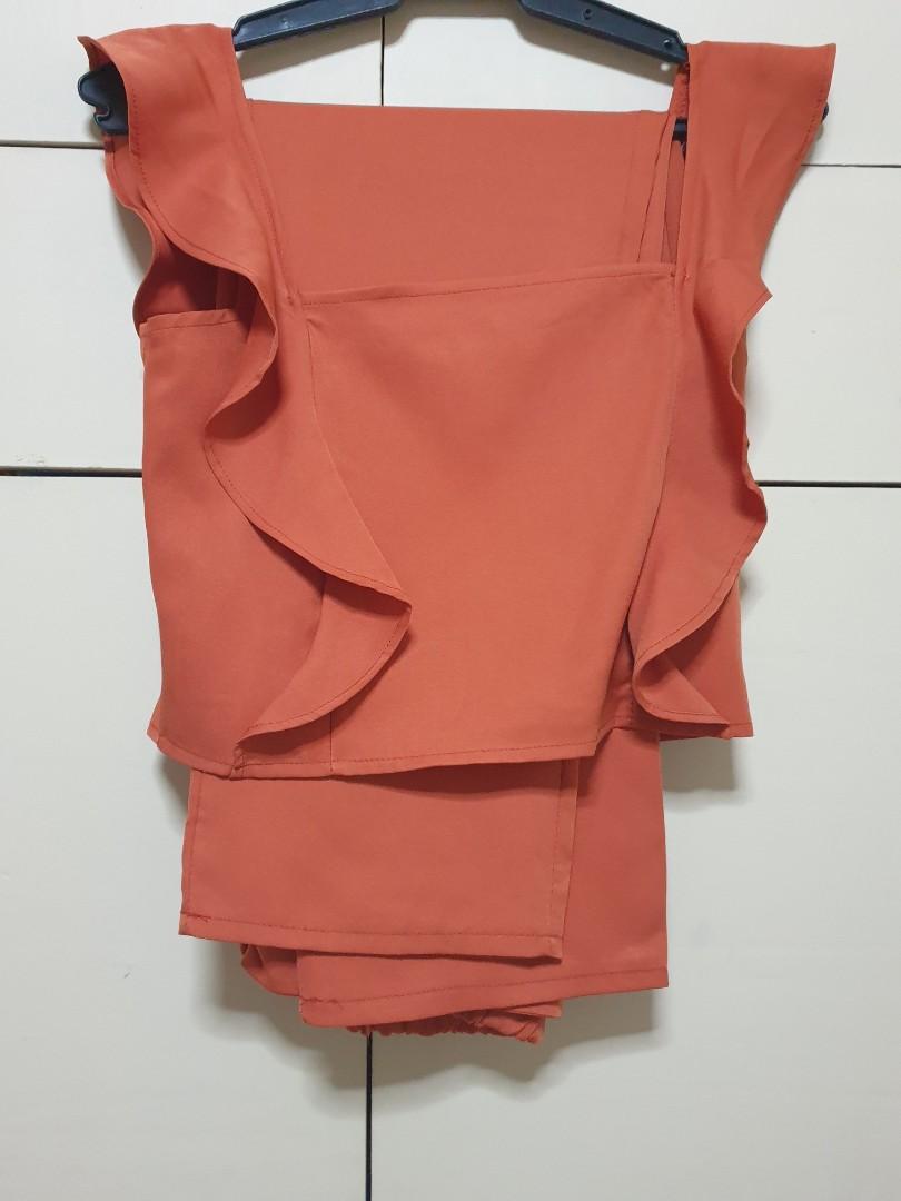 Rust Orange Coordinates (Category: Sets or Coordinates) located in Muntinlupa City. Submitted by alt1818 (Listing ID 1084034841, Image 3). Description: #prelovedcoordinates 💋Rust orange. 2 way -strap up or off shoulder . smocked back. Garterized pants with side pockets. 💋Decluttering 💋used once. like new 💋Price is based on item's condition. 💋Color may vary due to lighting condition 💋Please manage your expectations when buying peloved.