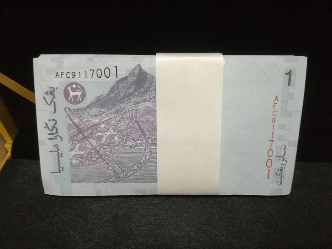 11th Rm1 stack (Category: Currency) located in Singapore. Submitted by hin8906 (Listing ID 1084176404, Image 1). Description: 100 running number AFC9117001-7100.