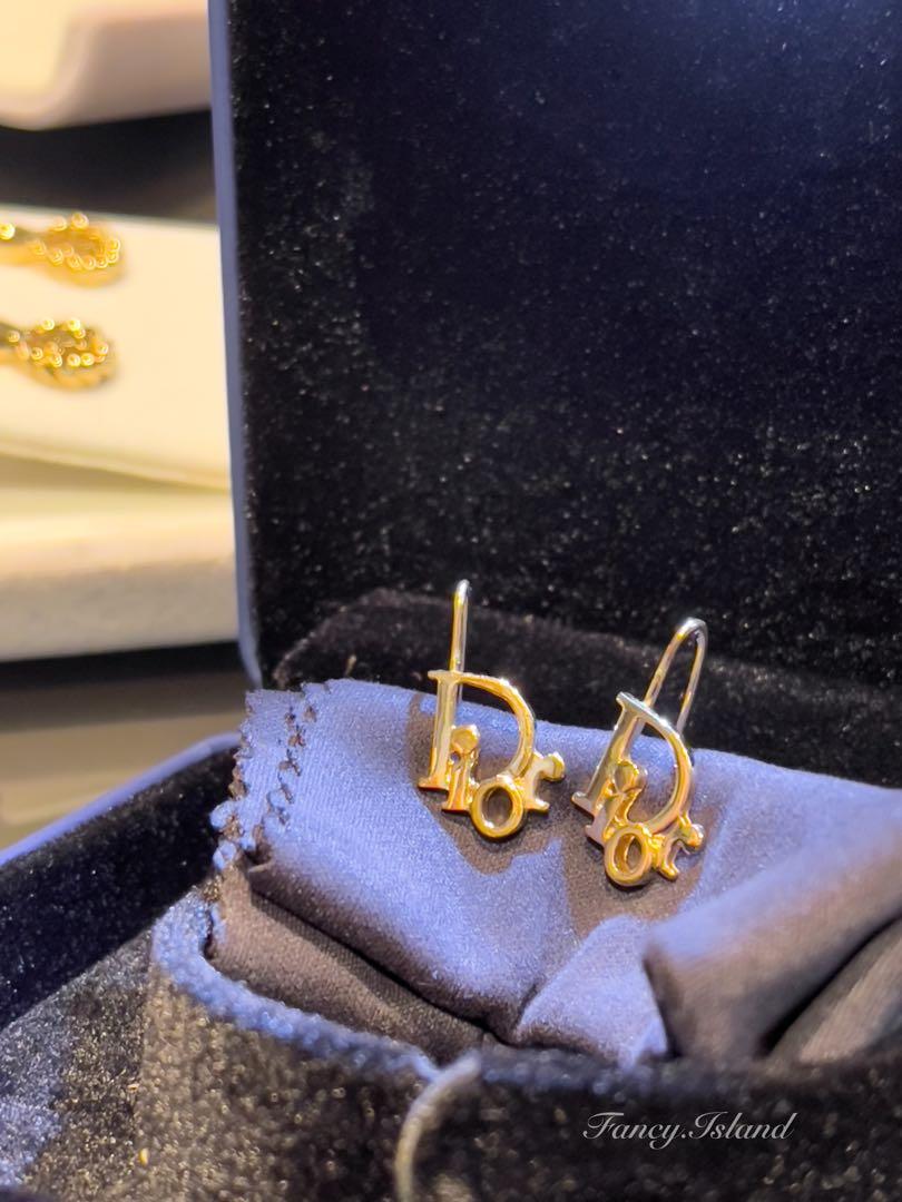 Christian dior gold earrings top