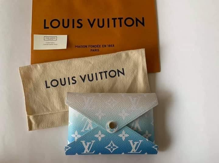 Kirigami Pochette (Category: Luxury Bags & Wallets) located in Manila. Submitted by bagislifeshop (Listing ID 1084310249, Image 1). Description: Limited Summer 2021 Collection Giant monogram canvas Blue color gradations Gold tone hardware Medium size, Can use as wallet Can fit iphone max & passport Dimensions-6.1”x4.5” Comes w/ receipt, card Dustbag and paperbag.