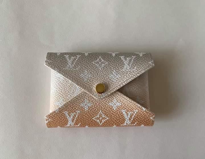 Kirigami Pochette (Category: Luxury Bags & Wallets) located in Manila. Submitted by bagislifeshop (Listing ID 1084310490, Image 1). Description: Limited Summer 2021 Collection Giant monogram canvas Misty grey - designer color with blush beige details Gold tone hardware Small size wallet Can fit multiple cards Dimensions-3.9”x2.8” Comes w/ receipt, card Dustbag and paperbag.
