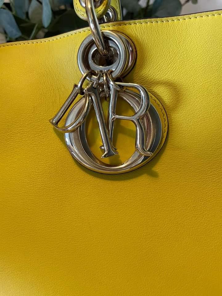 Dior Diorissimo Yellow Calf Medium Tote with Pouch (Category: Luxury Bags & Wallets) located in Manila. Submitted by bagislifeshop (Listing ID 1084526073, Image 3). Description: Hello 💛💛💛 100% Authentic Dior Diorissimo Yellow Calf Medium Tote with pouch Condition 8/10 Comes with Dustbag Strap and Pouch Disclaimer: All Products, Names, Brands, and Logos are owned by their respective brand owners. We are not affiliated with the Brand featured in