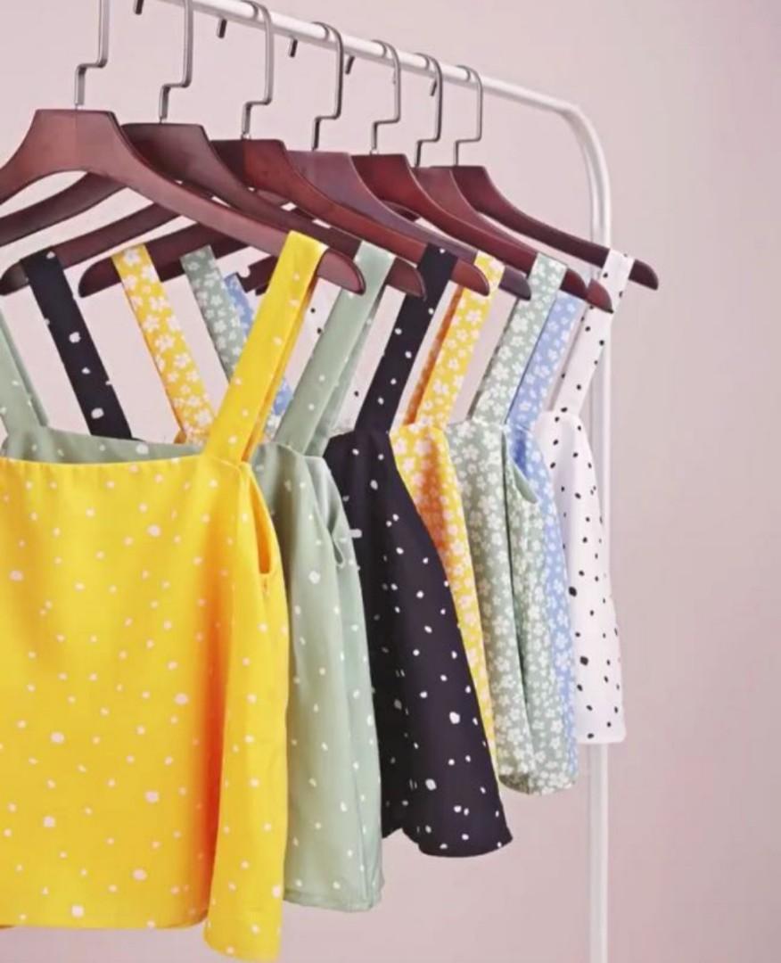 The Tinsel Rack Yellow Polka Dots Nixon Flare Top (Category: Sleeveless) located in Singapore. Submitted by wardrobemirror (Listing ID 1084652828, Image 1). Description: Size M Wore once Warehouse exclusive design No trades and nego.