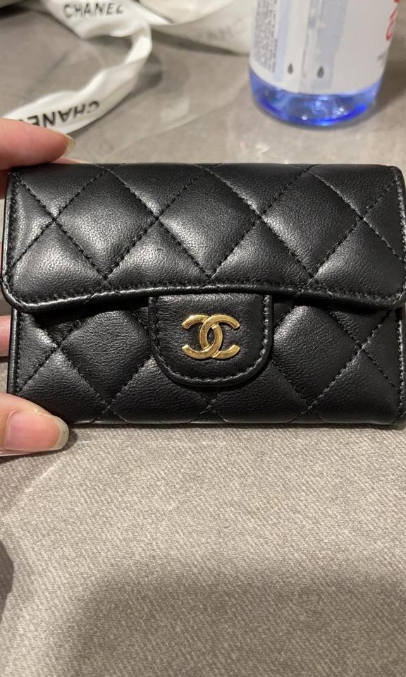 Authentic Chanel XL Cardholder in Embossed Leather, Luxury, Bags & Wallets  on Carousell