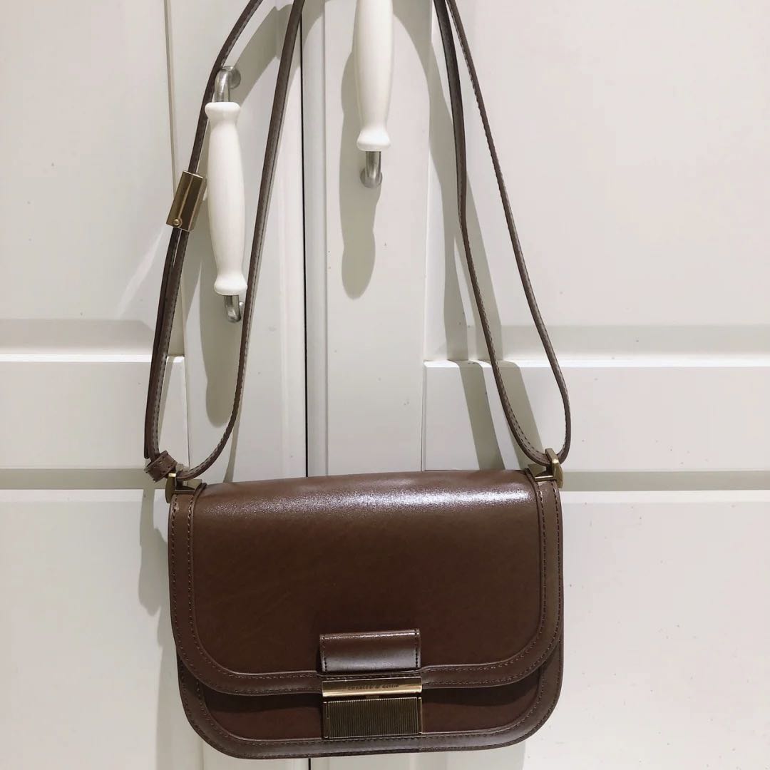 Charles & Keith Metallic PushLock Crossbody Bag, Women's Fashion, Bags