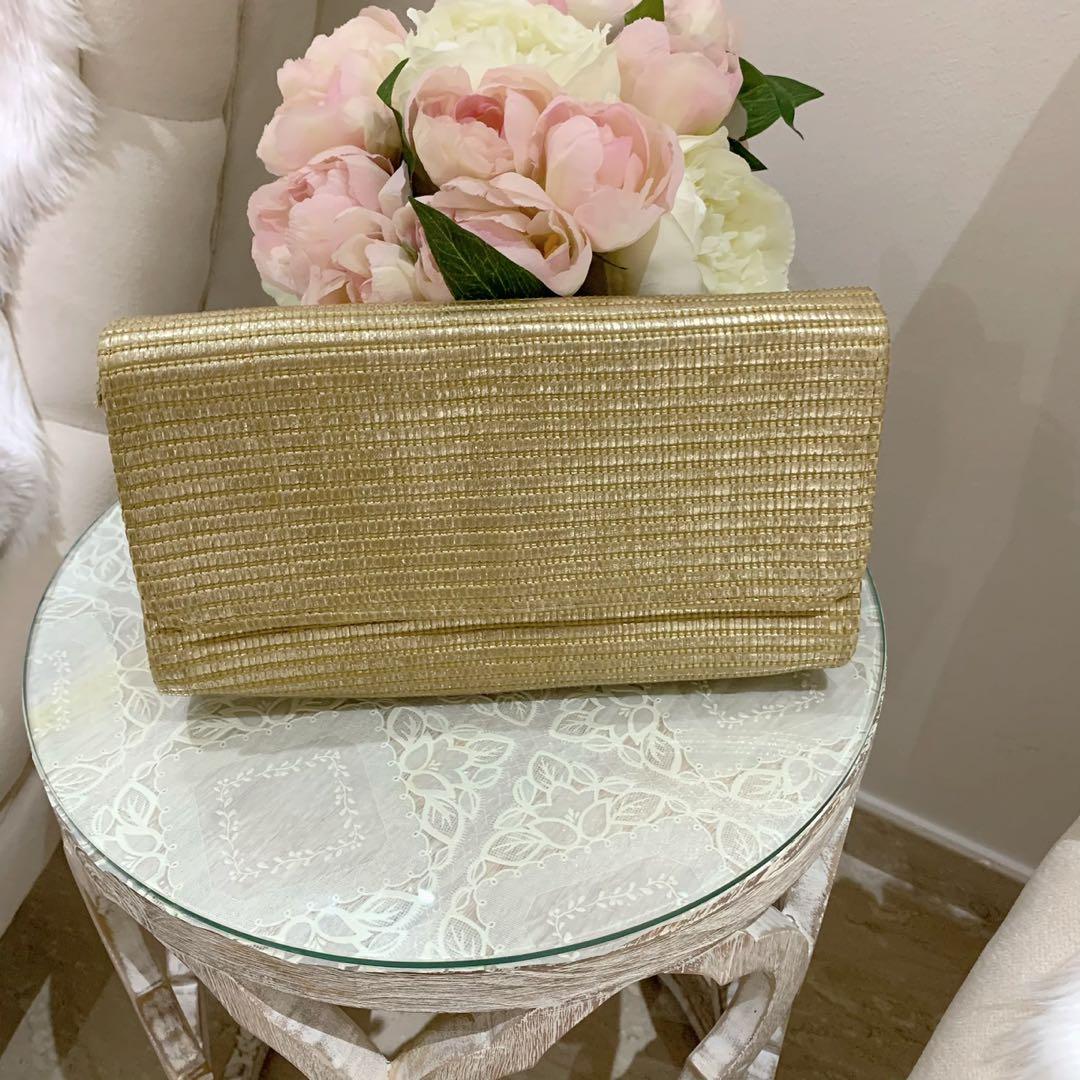 Gold woven clutch clearance bag