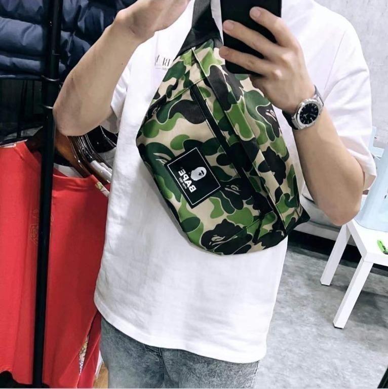 A bathing ape side bag green camo.