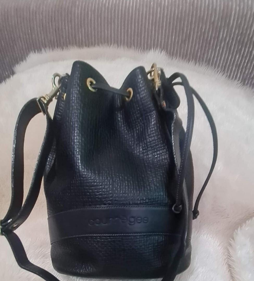Authentic Courreges Paris 3-Way Bag (Category: Luxury Bags & Wallets) located in Quezon City. Submitted by lix12 (Listing ID 1084901152, Image 1). Description: 💯 Authentic ❣May be used as a shoulder/crossbody bucket bag and backpack. ❣Color: Black ❣Size: Medium ❣Measurements: 12'L x 11'H x 6'W ❣ With detachable straps and with slightly tarnished hardwares as sign of usage. ❣Has inner middle zipper compartment ❣Good condition ❣Made in France 🇫🇷