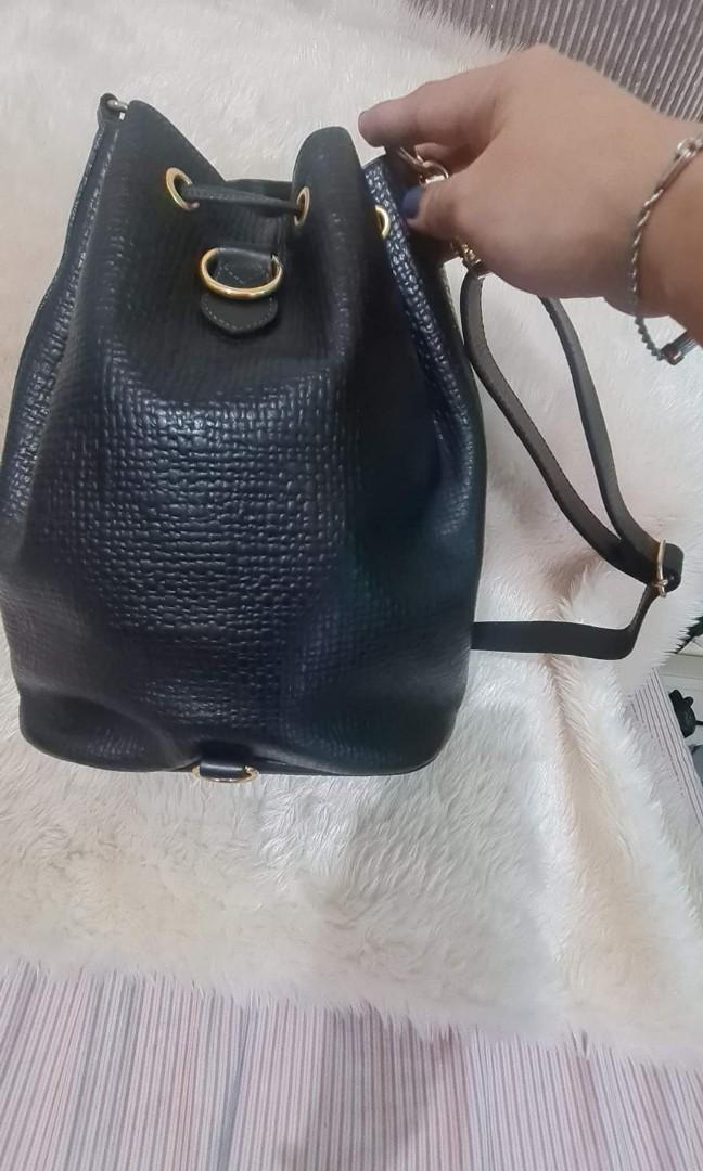 Authentic Courreges Paris 3-Way Bag (Category: Luxury Bags & Wallets) located in Quezon City. Submitted by lix12 (Listing ID 1084901152, Image 2). Description: 💯 Authentic ❣May be used as a shoulder/crossbody bucket bag and backpack. ❣Color: Black ❣Size: Medium ❣Measurements: 12'L x 11'H x 6'W ❣ With detachable straps and with slightly tarnished hardwares as sign of usage. ❣Has inner middle zipper compartment ❣Good condition ❣Made in France 🇫🇷