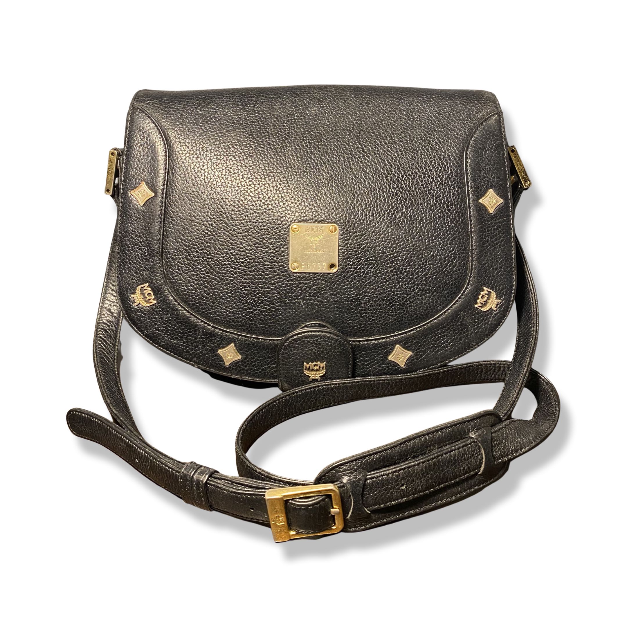 Mcm sling bag black discount