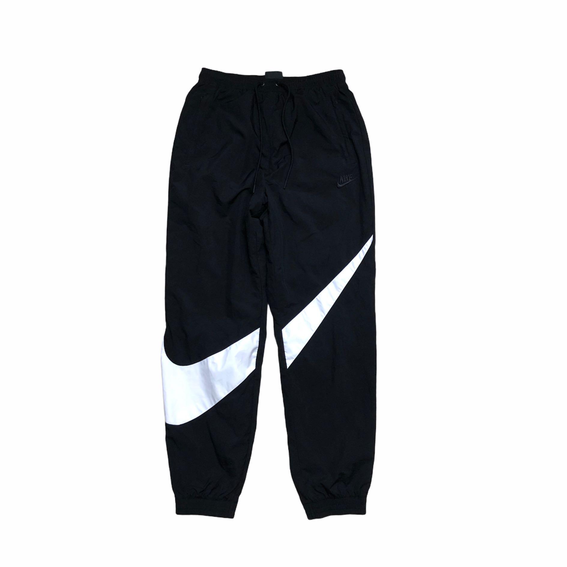 Nike tick clearance tracksuit bottoms