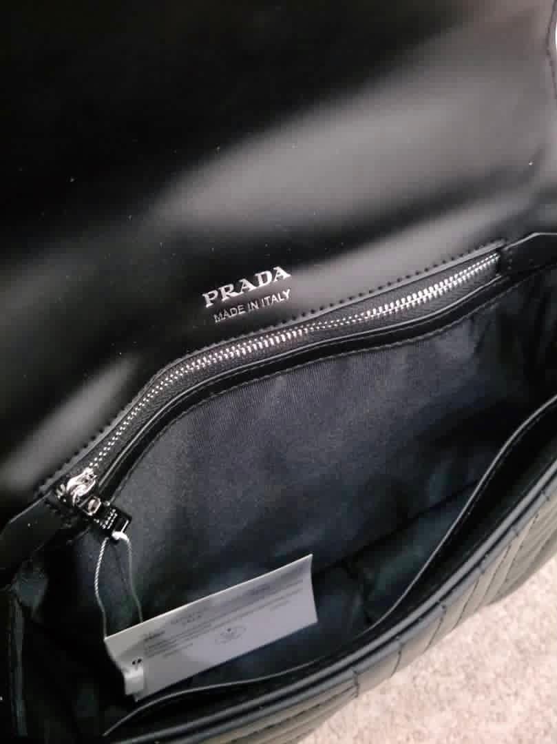 Prada bag with silver chain deals