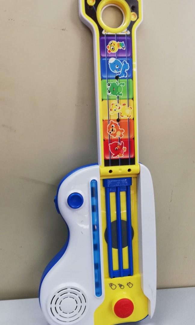 Baby einstein flip hotsell & riff keytar