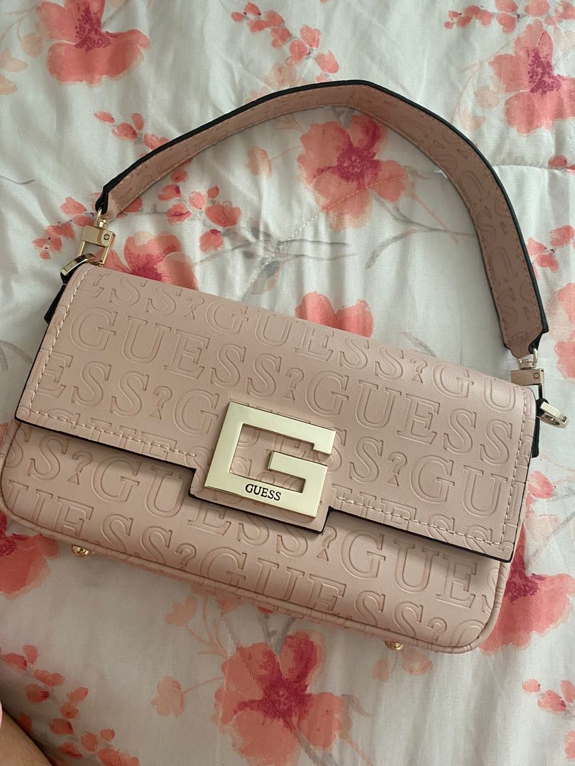 guess pink sling bag