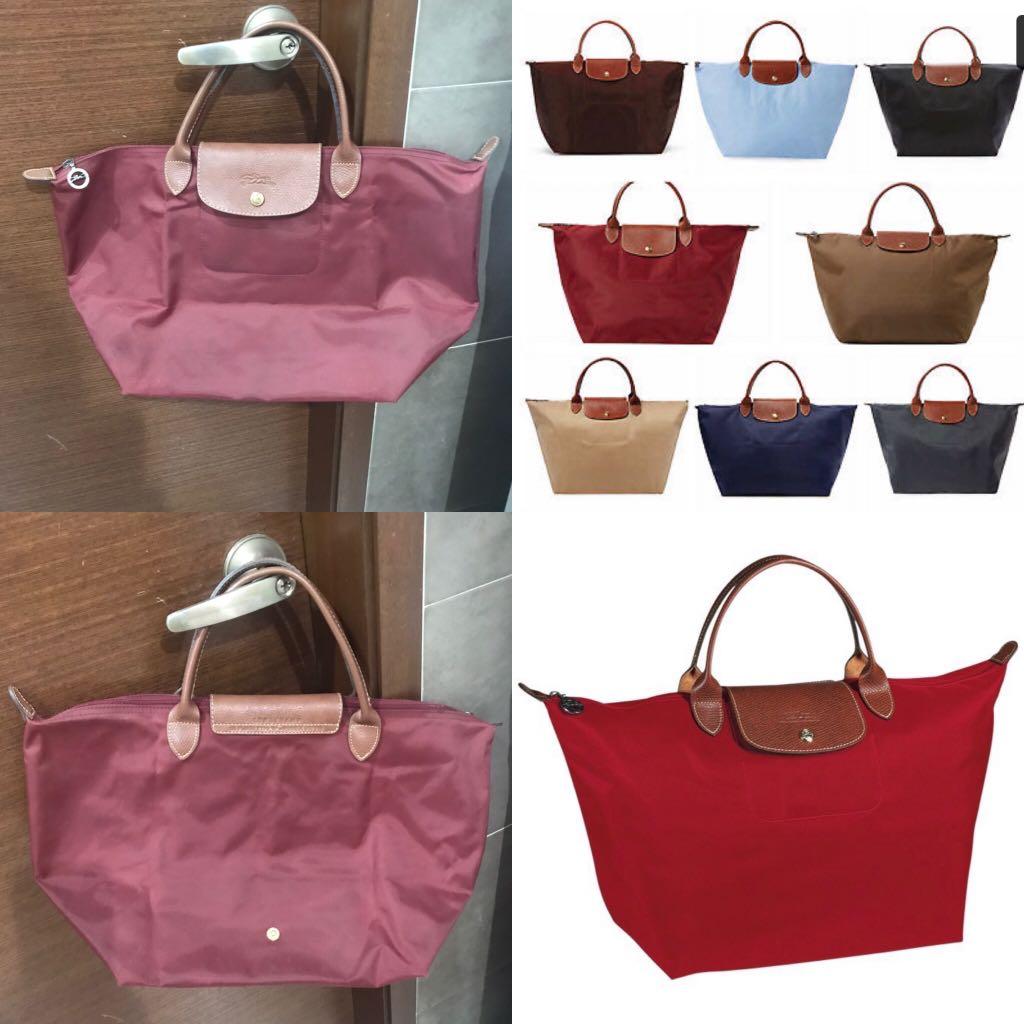 Longchamp Pouch with Handle Le Pliage, Luxury, Bags & Wallets on Carousell