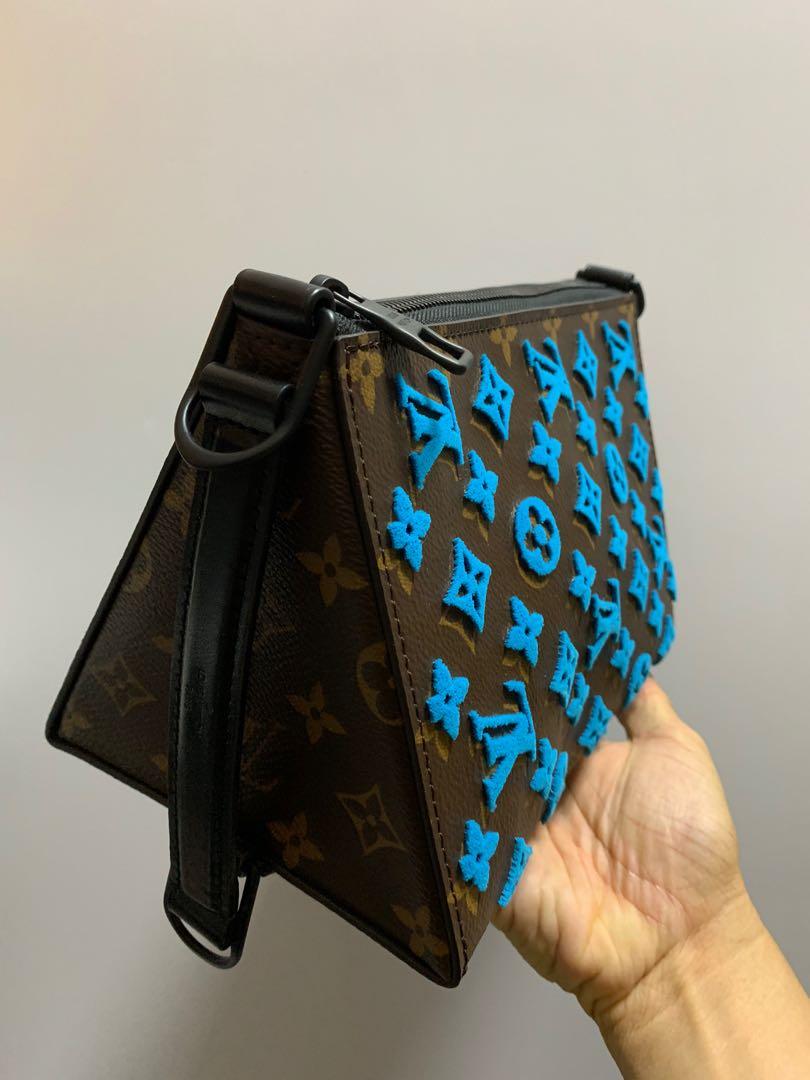 Lv triangle messenger hotsell bag