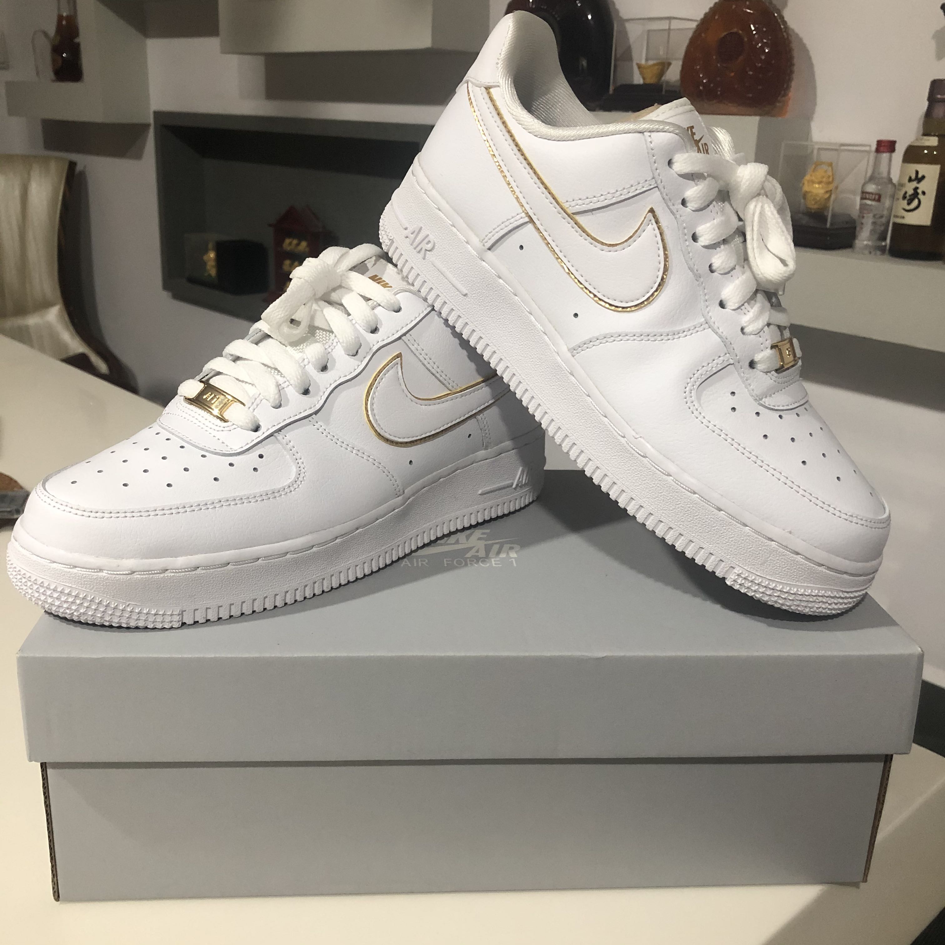 Nike white clearance with gold swoosh
