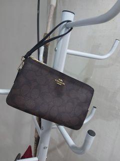 Coach double wristlet like new