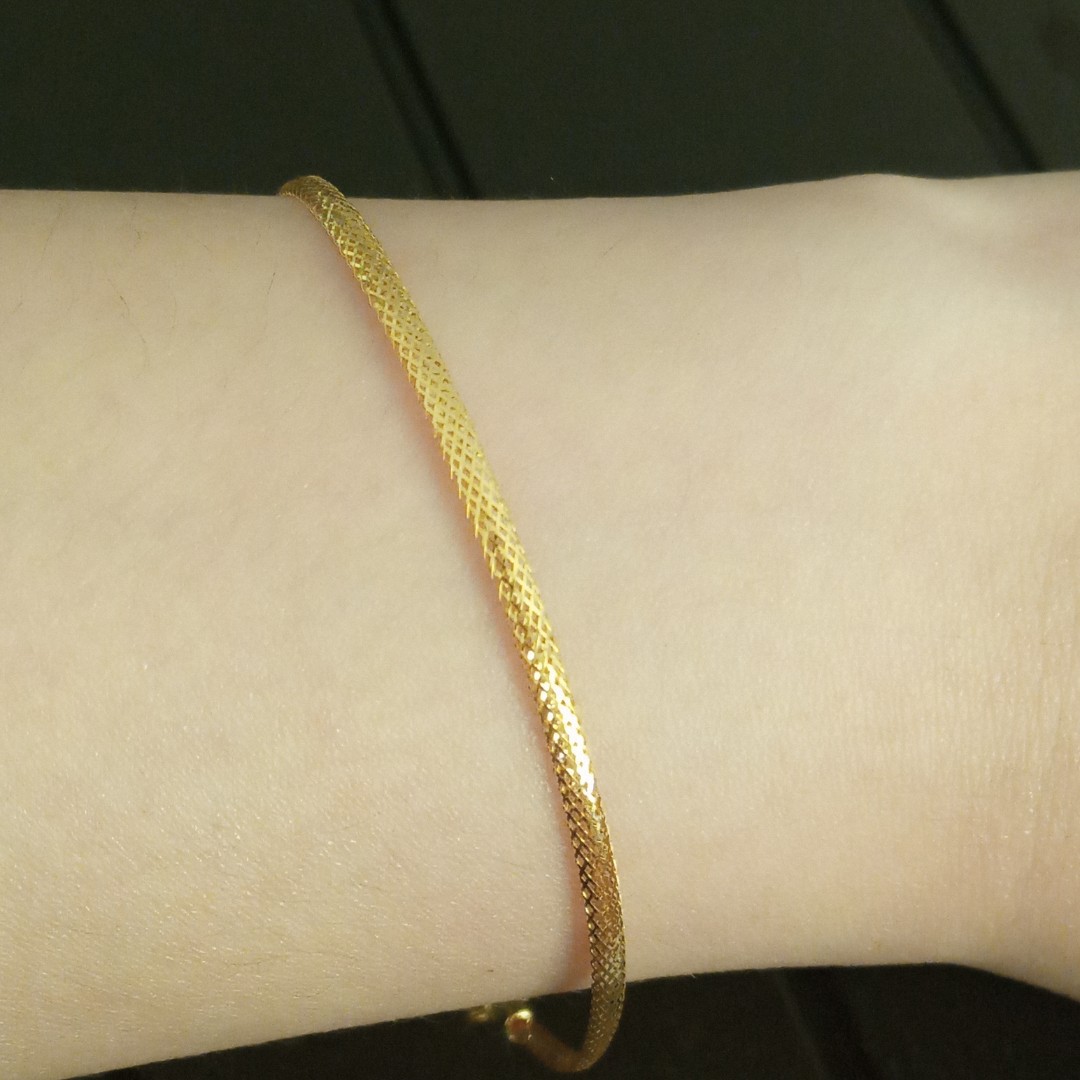 omega bracelet gold