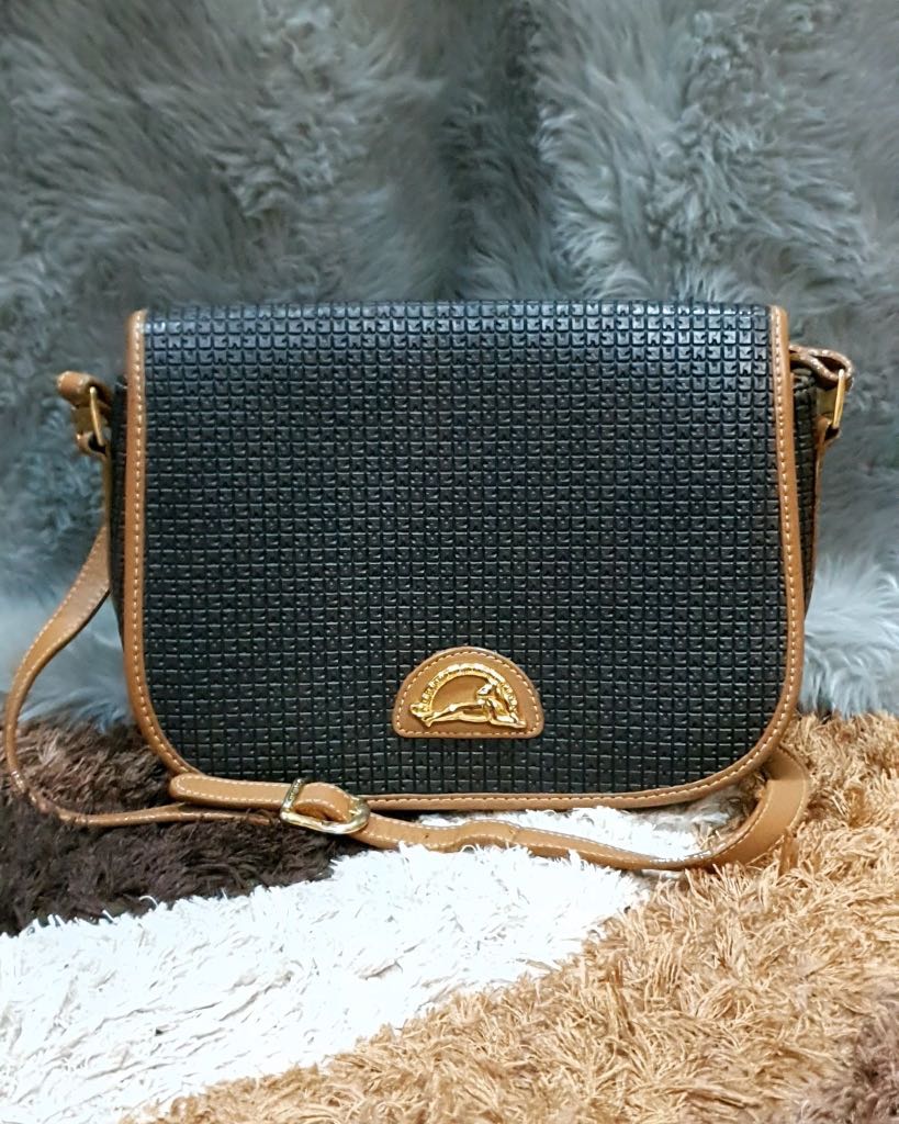 Ted lapidus bags prices online