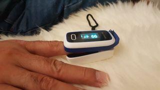 Pulse Oximeter  with Free Battery and USB Light
