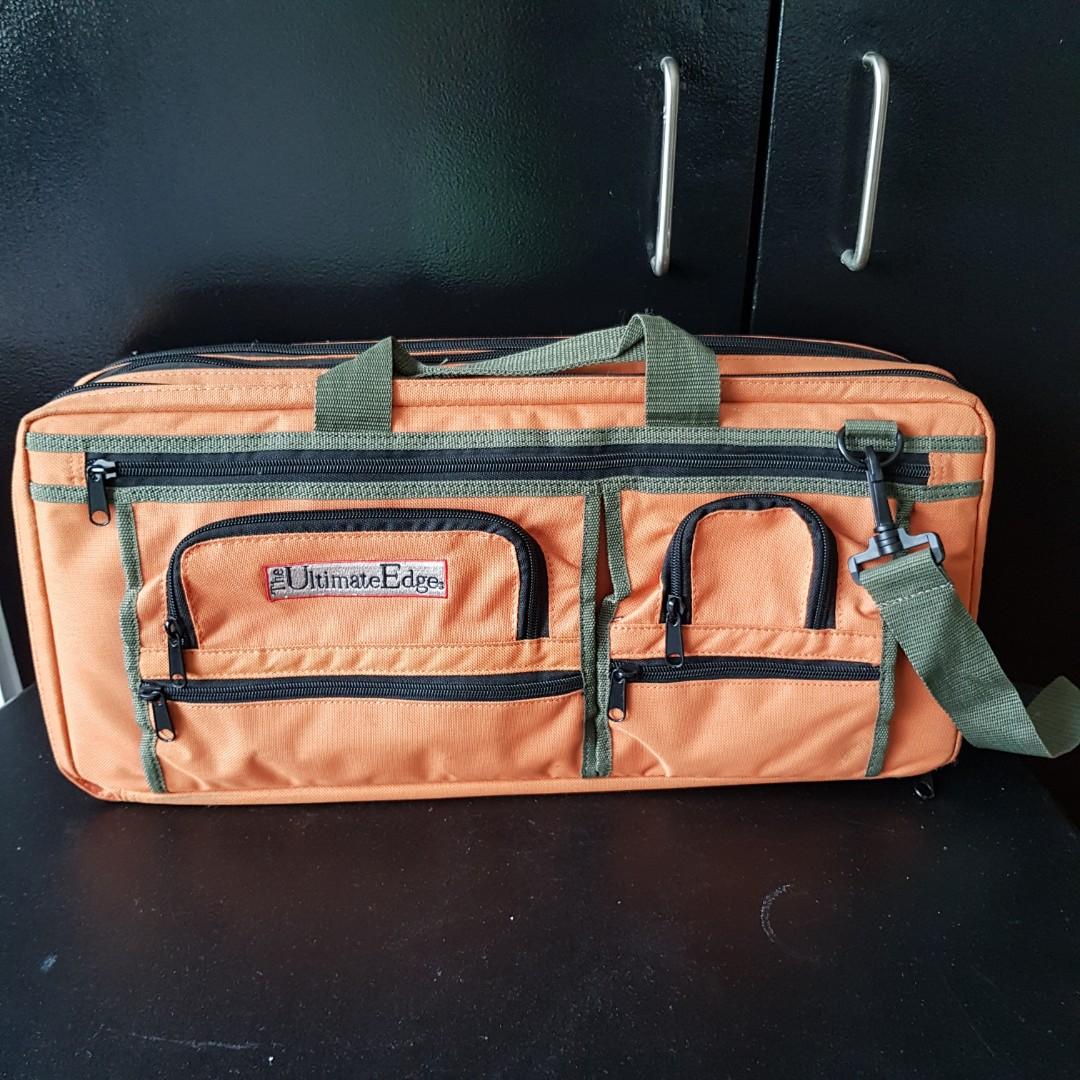 The Ultimate Edge Evolution Deluxe 18 pc Chef Knife Case with 5 Exterior Pockets (Category: Other Kitchenware & Tableware) located in Paranaque City. Submitted by bluegreen689 (Listing ID 1079656928, Image 1). Description: The Ultimate Edge Evolution Deluxe 18 pc Chef Knife Case with 5 Exterior Pockets Condition: 9/10. Needs cleaning because it has been in storage at home for years. Never been brought to work. It was used to store knives and kitc