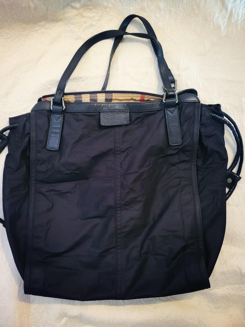 BURBERRY NYLON TOTE (Category: Luxury Bags & Wallets) located in Manila. Submitted by shoppingspree008 (Listing ID 1069736637, Image 1). Description: This bag is pre loved but in excellent condition still. Luxury good for affordable price :) Please see photos to appreciate. No return no exchange policy. Price is slightly negotiable for solo purchase and bundle price discount for 2 or more bag purchases.Posting will be updated once sold.Just pm yo