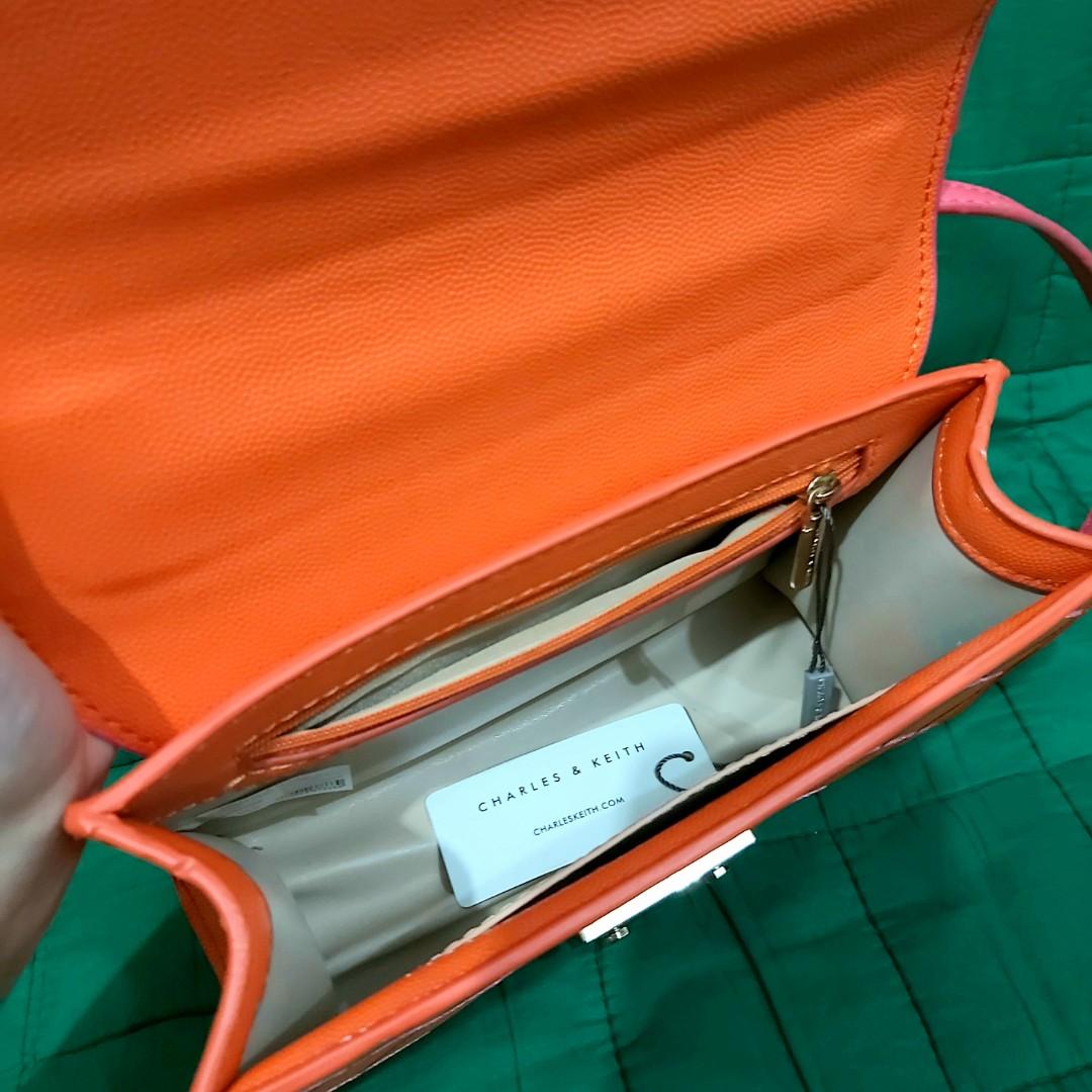 charles and keith orange sling bolsa