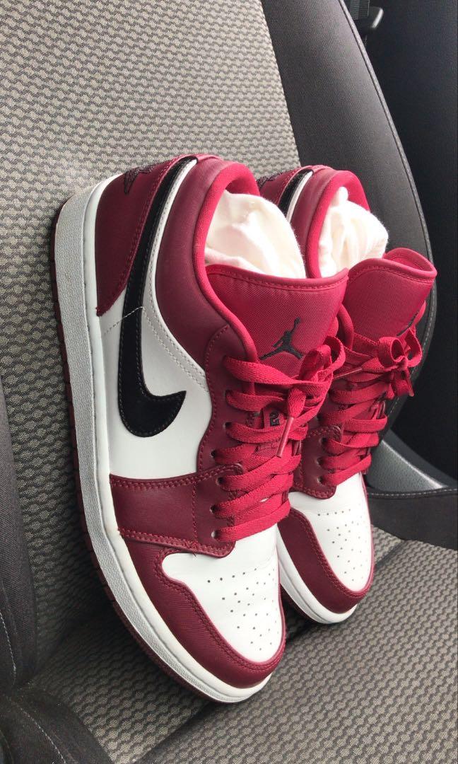 jordan 1 noble red on feet