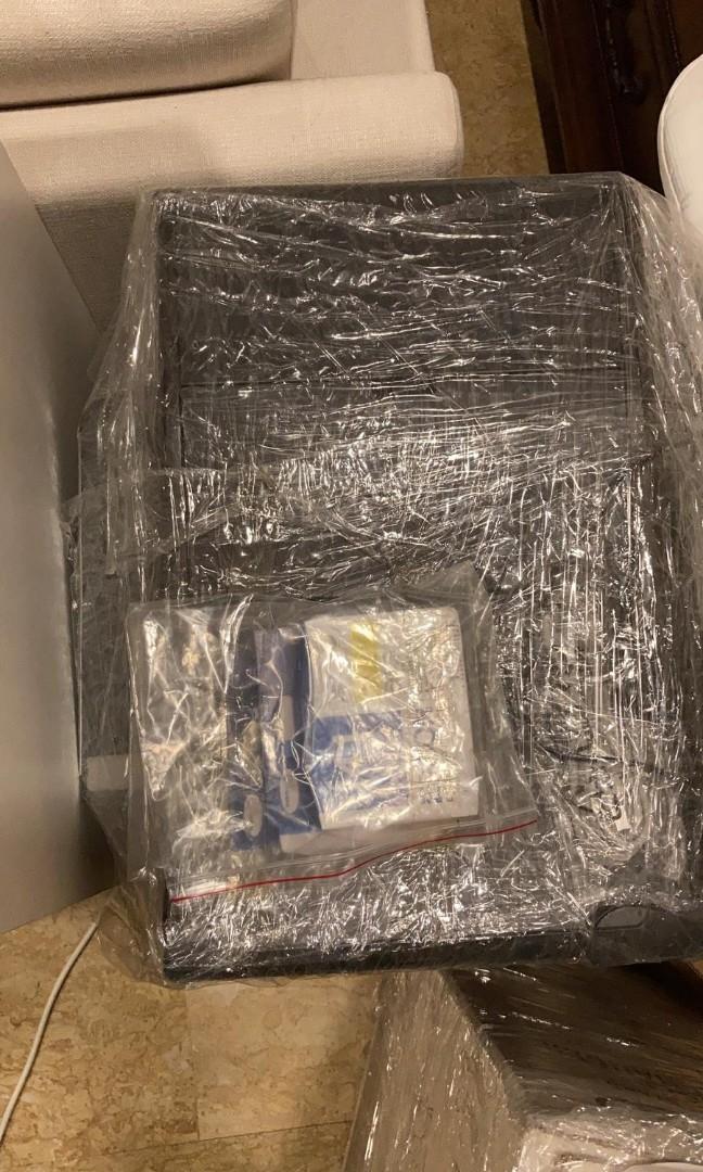 Epson printer (Category: Printers, Scanners & Copiers) located in Singapore. Submitted by lylysa (Listing ID 1080116333, Image 3). Description: Kept in cling wrap to maintain cleanliness. Brand new ink cartridge in yellow and cyan..