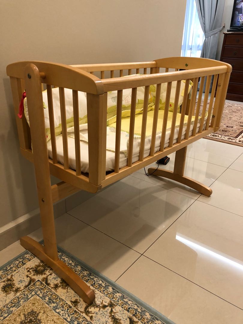 Mothercare top swinging crib