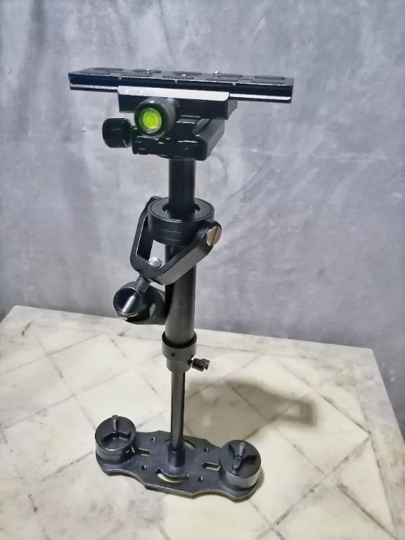 S40 Handheld Stabilizer Steadicam (Category: Gimbals & Stabilizers ) located in Tarlac. Submitted by mighty.peterjohn08 (Listing ID 1080183467, Image 1). Description: S40 Handheld Stabilizer Steadicam - 40 cm Stabilizer - for shooting smooth/stabilize videos - for camcorders, slr/dslr, point and shoot cams - made from high quality tough aluminum alloy No issues in the stabilizer, minsan lang nagamit, need to declutter.