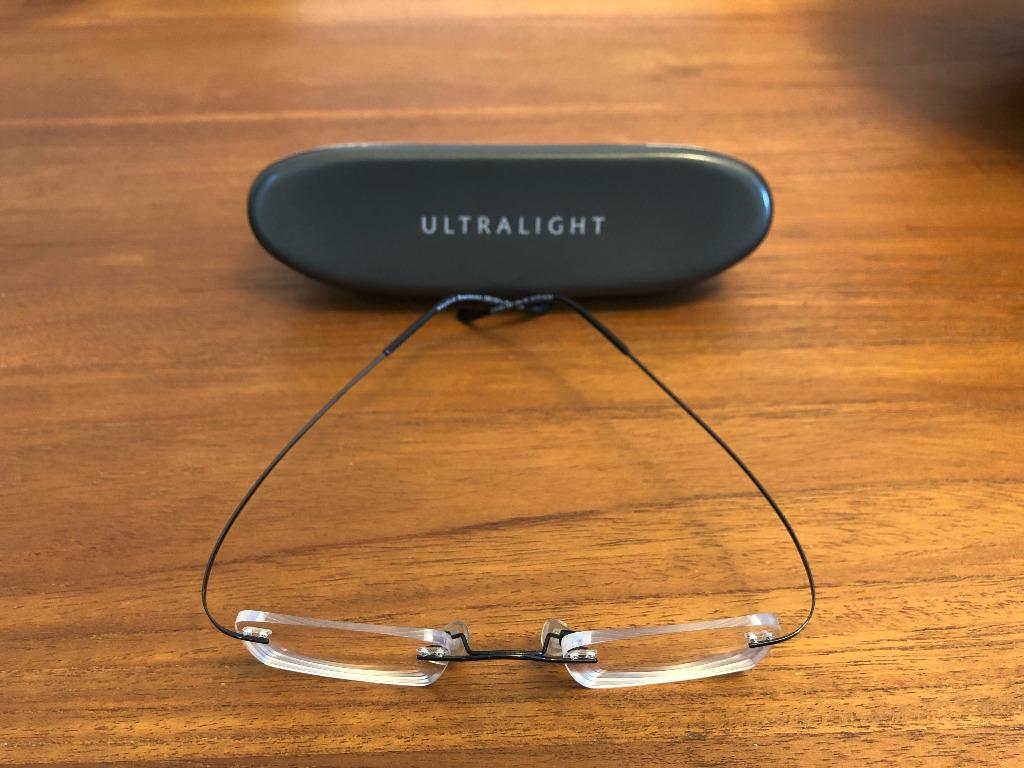 specsavers uk mens ultralight lite 48 titanium gunmetal rimless frameless glasses frames eyeglasses like silhouette men s fashion watches accessories sunglasses eyewear on carousell