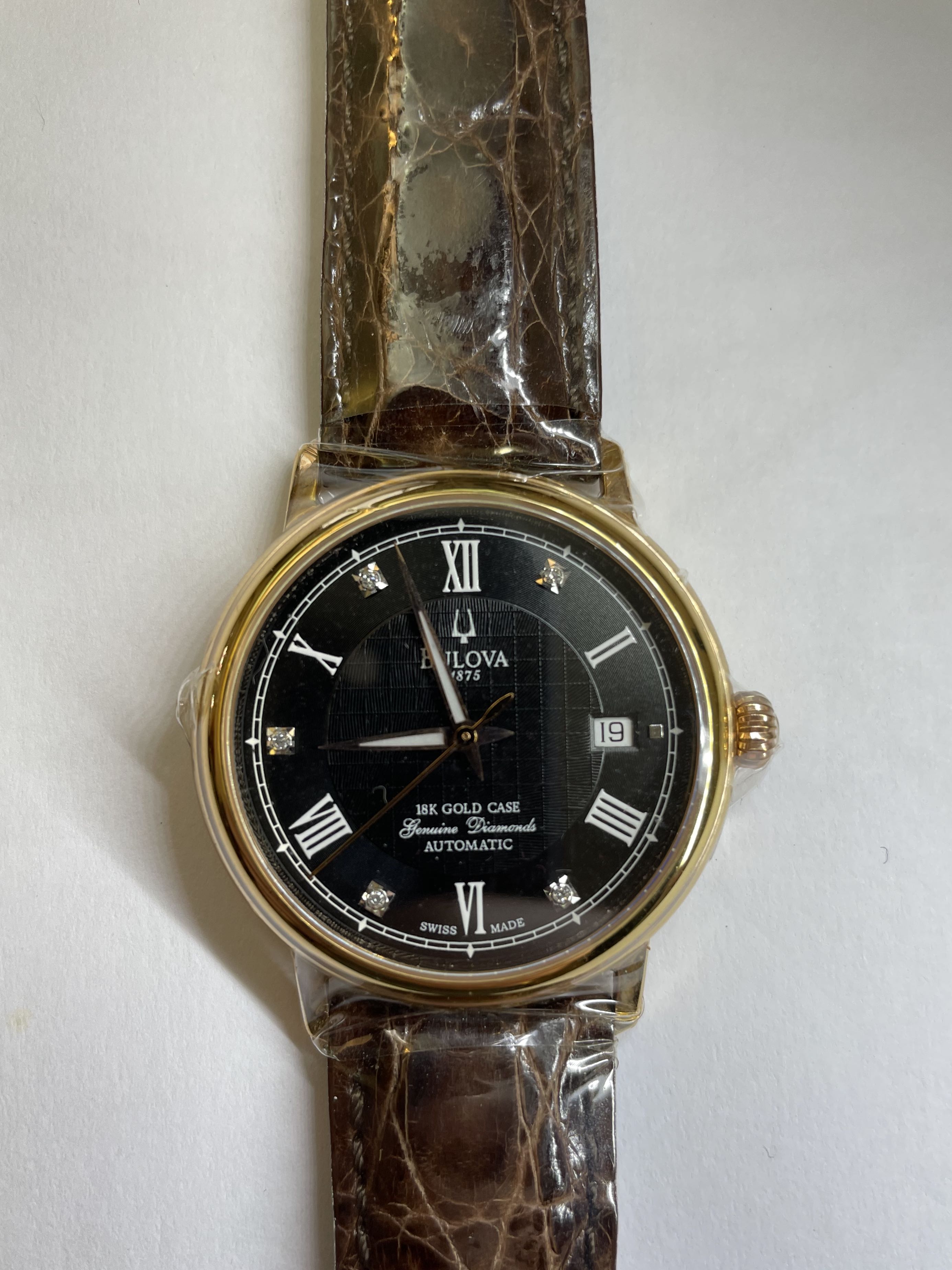 Bulova 18k gold sales watch swiss made