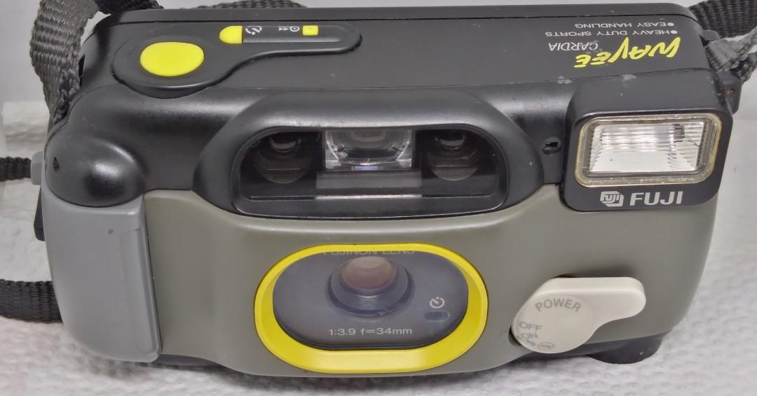 Fuji cardia wavee film camera (Category: Cameras) located in Las Pinas. Submitted by film101 (Listing ID 1080475636, Image 3). Description: Fuji wavee cardia Film camera Accdg to stamp in the camera it's heavy duty sports and easy handling My own inputs Its tough and water resistant pns camera -with 34mmf3.9 optics -TIMER at the side of lens for easy looking, blinking! -Quartz date at the back -Adjustment knob for power ON\OFF and Flash off in th