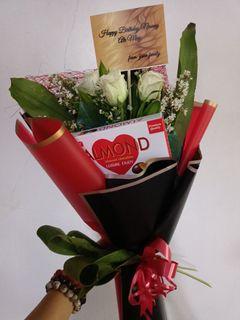 Flower bouquet with chocolate