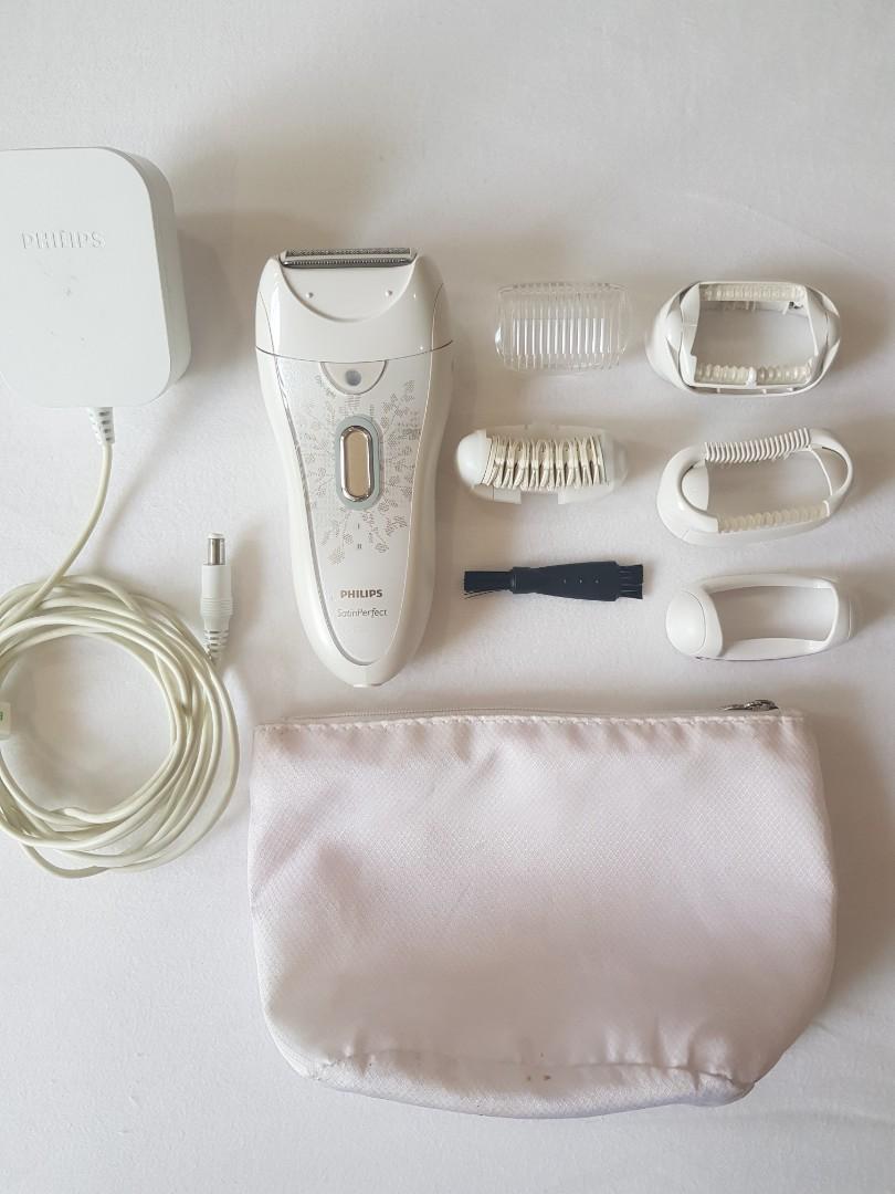 Philips Epilator Satin Perfect (Category: Hair) located in Makati City. Submitted by mckie (Listing ID 1085106751, Image 1). Description: Slightly used Cleaned and disinfected using UV care Tweezer not included Satin perfect's extra wide head and textured ceramic discs remove more hair in one stroke, giving you the ultimate epilation experience! this deluxe model comes with 4 attachments for the best in head to toe solutions. a built-in opti-ligh