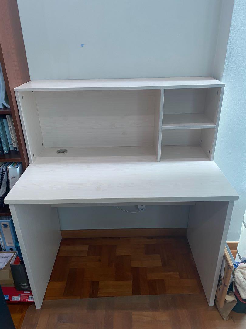 Study Table (Category: Tables & Sets) located in Singapore. Submitted by bugfiend (Listing ID 1084942465, Image 2). Description: Study table with shelf Dimensions: 100cm x 50cm Height of shelf: 35cm Color: Light pine Used <1y, condition 10/10 with no scratches or discolourations. Custom made piece, selling at low price due to moving. Self-collect or self-arrange for pickup..