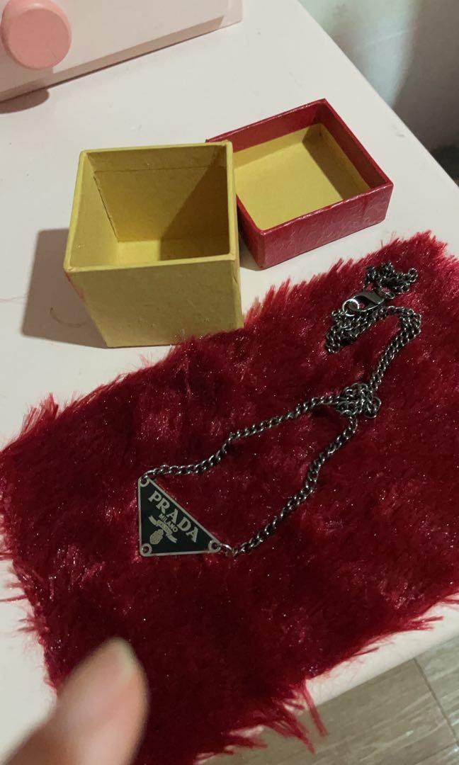 Prada gold and black reworked necklace authentic, Women's Fashion, Jewelry  & Organisers, Necklaces on Carousell