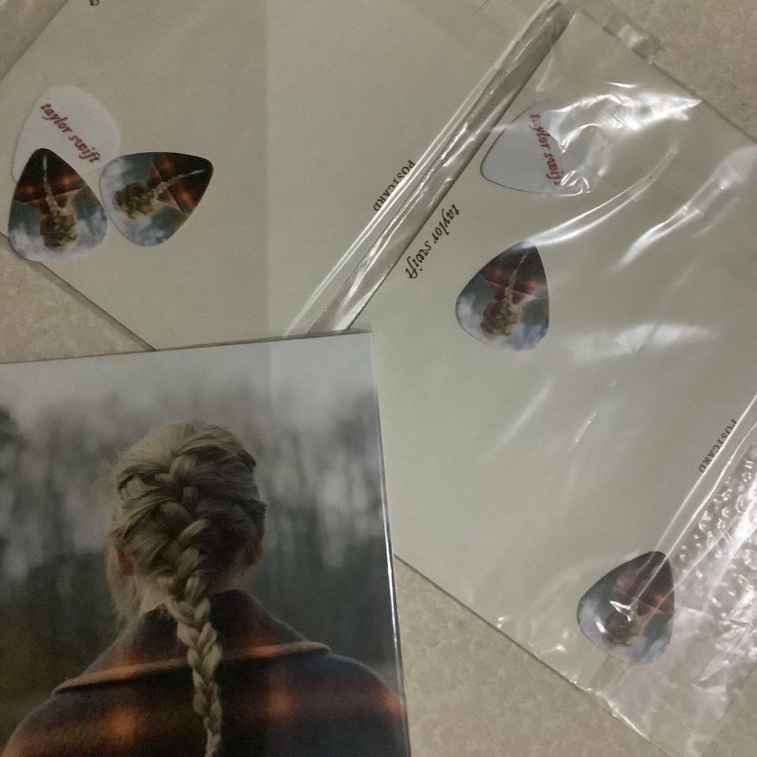 Evermore Guitar Picks Set + Evermore Exclusive Postcard (Category: CDs & DVDs) located in Manila. Submitted by stefandraboutique (Listing ID 1086826134, Image 1). Description: Signed Folklore CD spare copy: 1999 php Evermore guitar pic + Exclusive Postcard: 999 php ON HAND and ready to ship❣️.