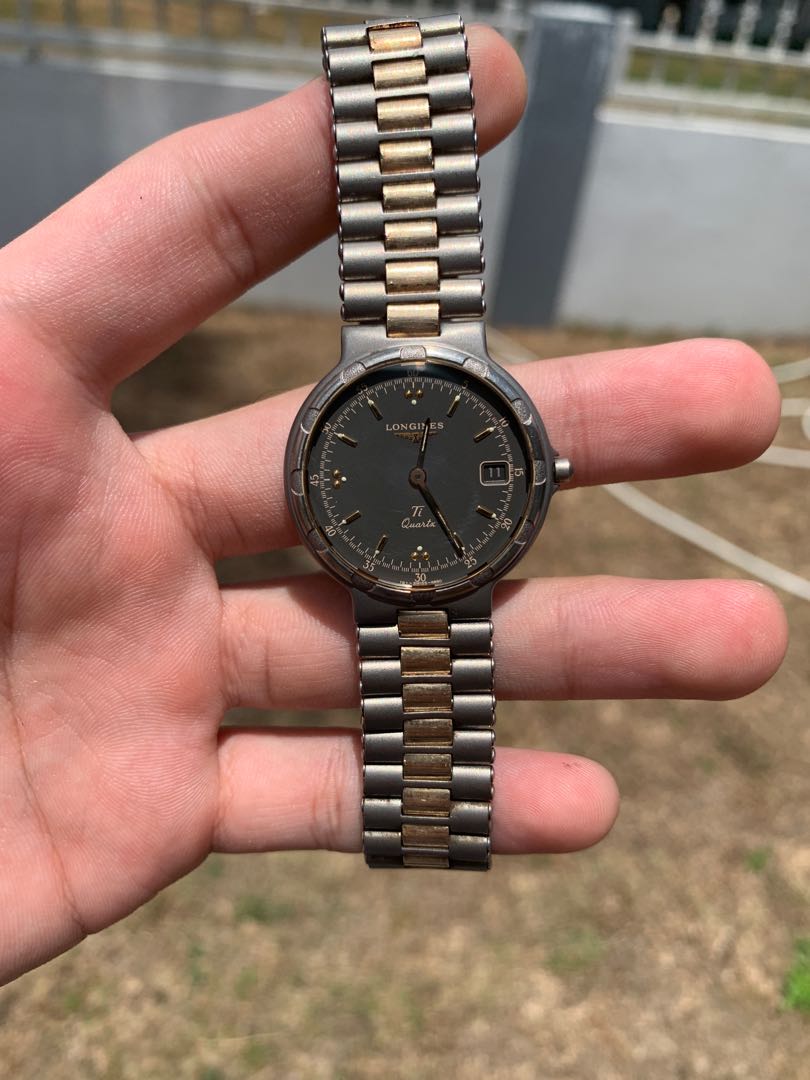 Longines conquest titanium deals