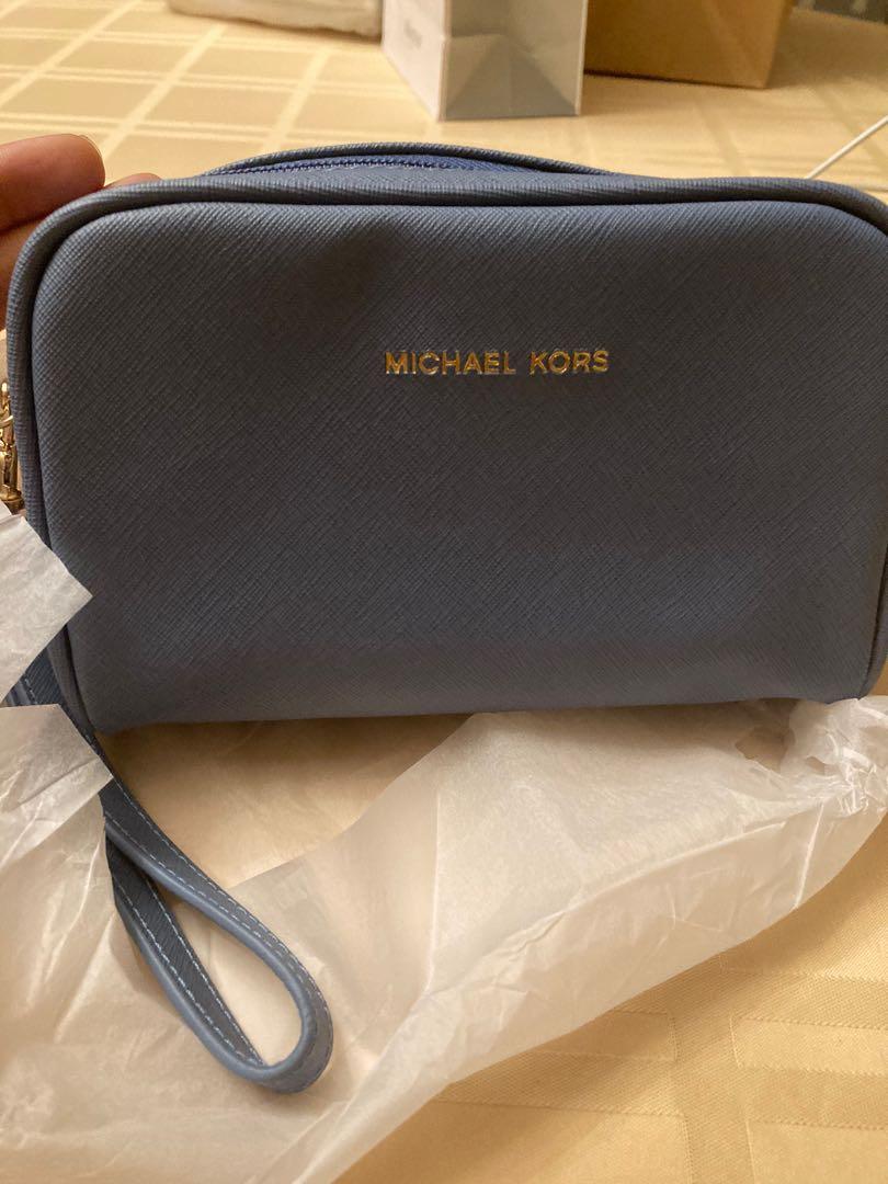 Michael Kors travel Pouch, Luxury, Bags & Wallets on Carousell