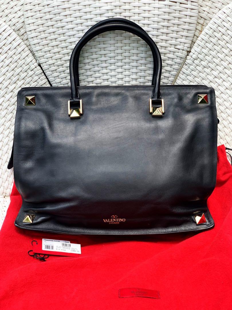 Valentino Black Leather Bag (Category: Luxury Bags & Wallets) located in San Pedro. Submitted by wanderluxesly (Listing ID 1086934257, Image 1). Description: Good as new Valentino Rock Stud Leather Tote Bag. Barely Used. Complete with Dust Bag and Tag with Price. .