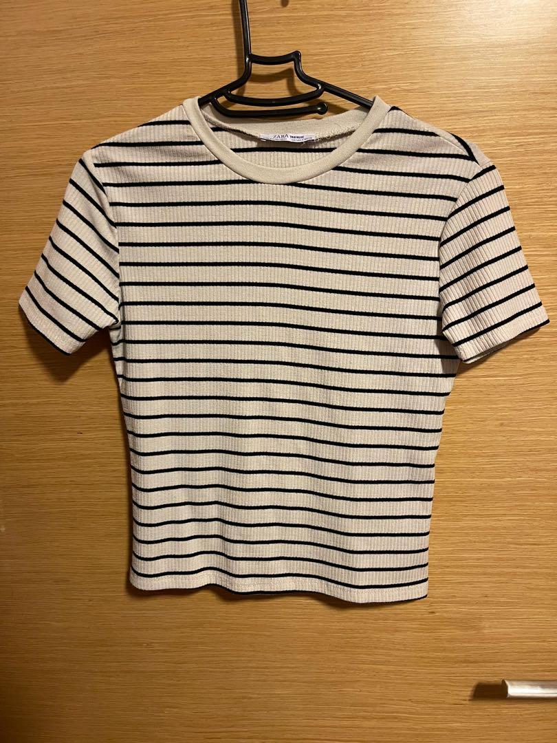 Zara Striped Basic Tee (Category: Other Tops) located in Singapore. Submitted by zephyrsc (Listing ID 1087051601, Image 1). Description: Striped tee with short sleeves, slightly cropped and best paired with high waisted bottoms. .