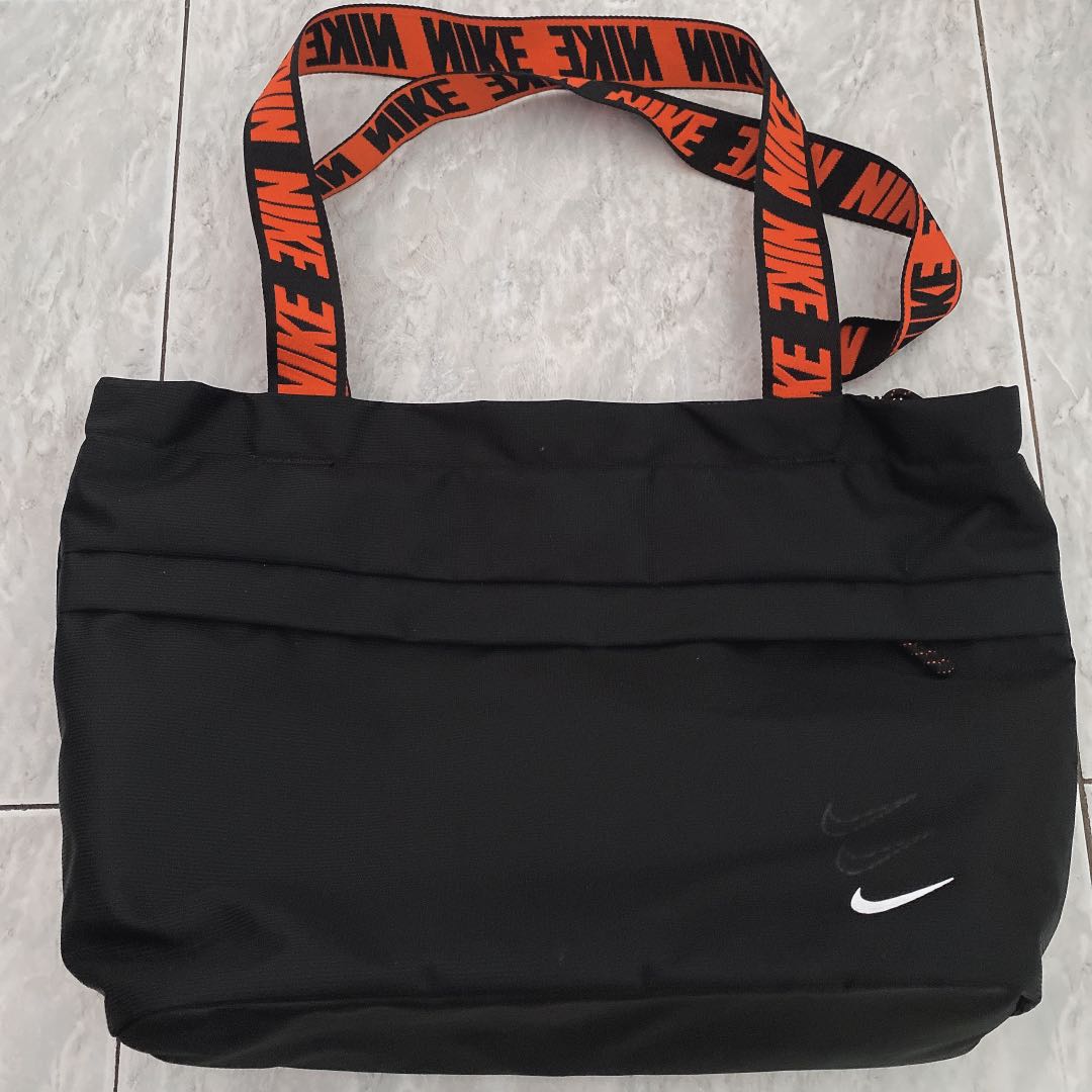 Nike tote bag in black with orange taping strap Women s Fashion