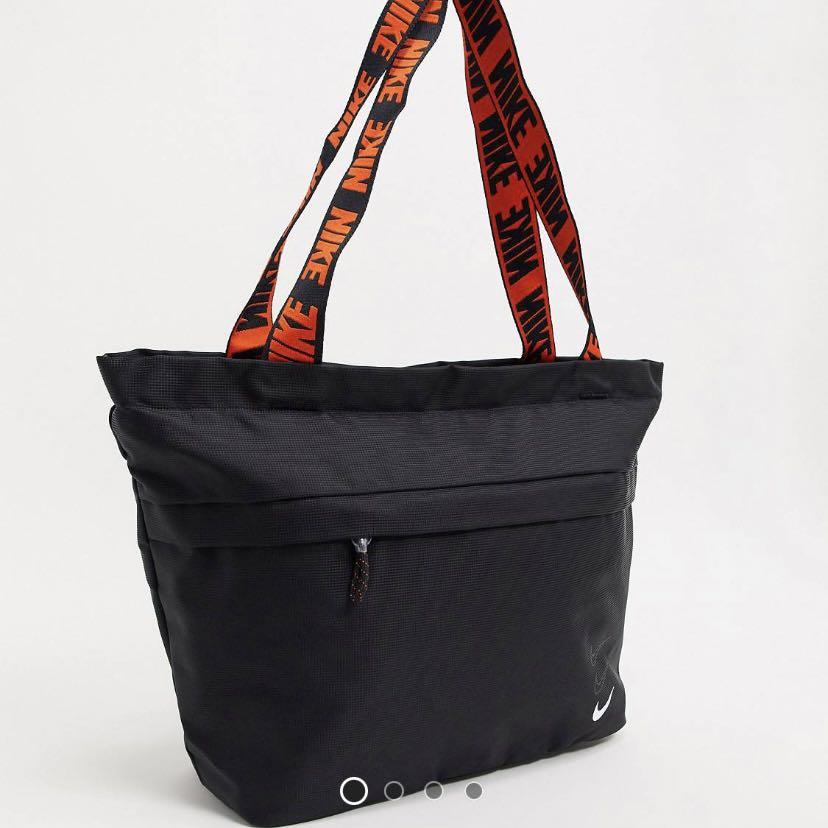 Nike tote bag in black with orange taping strap clearance