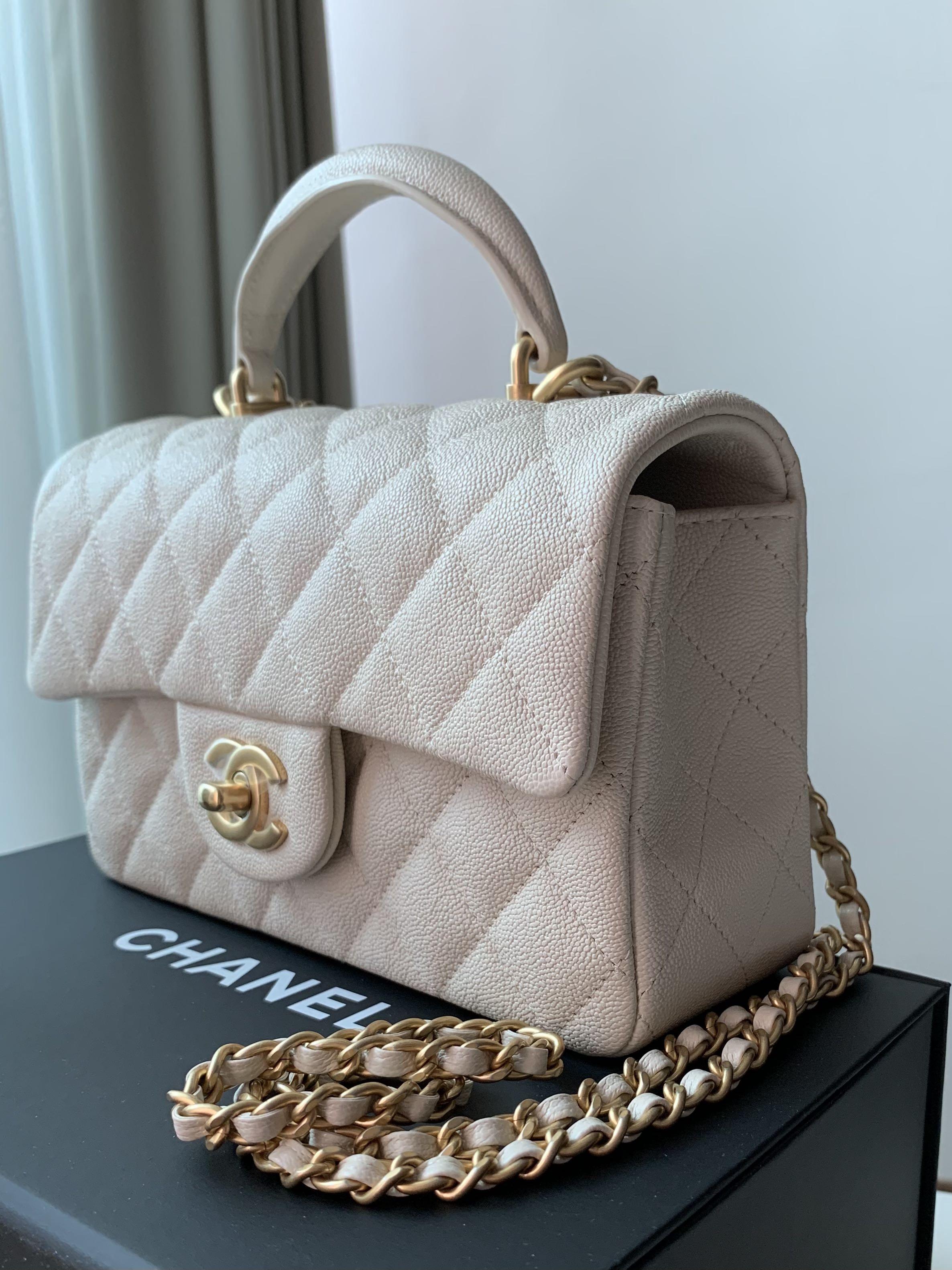 Authentic Chanel 21s mini flap with top handle in beige caviar, Luxury,  Bags & Wallets on Carousell