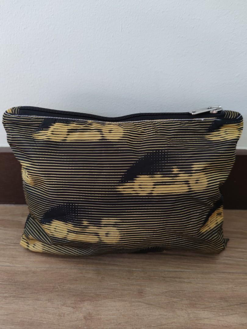 Prada Pouch (Category: Luxury Bags & Wallets) located in Pasig City. Submitted by armoire_deluxe (Listing ID 1087100269, Image 2). Description: Pre❤️ item. In good condition..