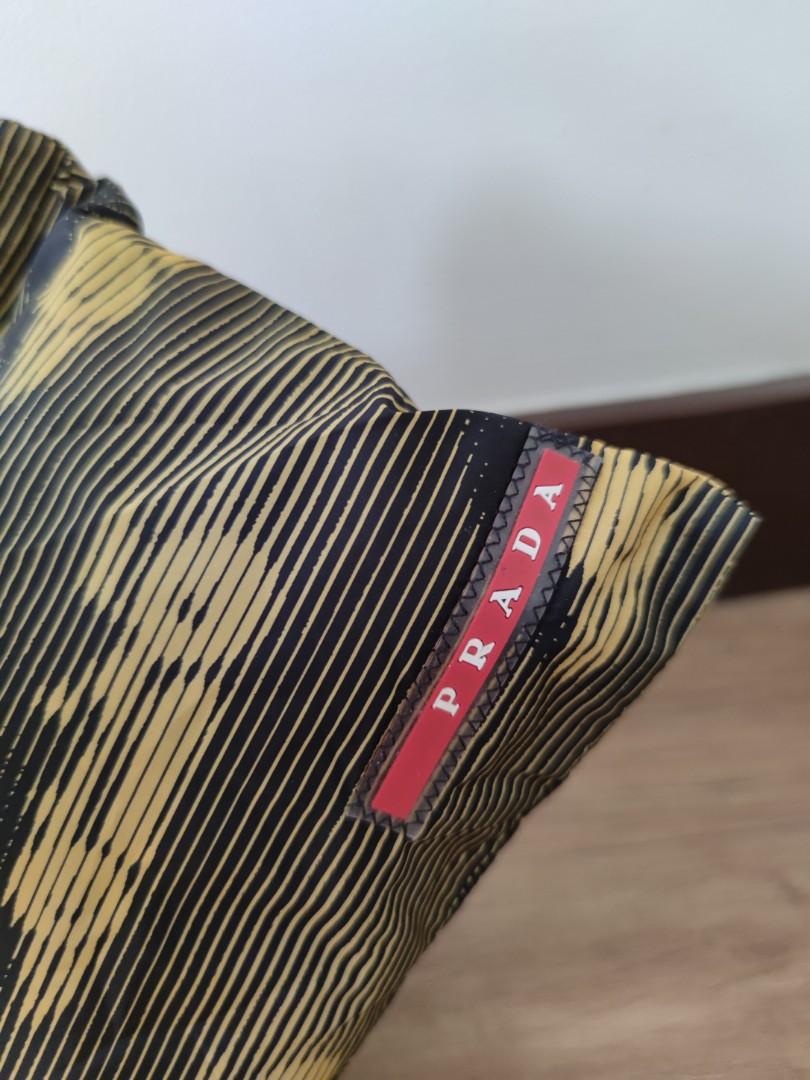 Prada Pouch (Category: Luxury Bags & Wallets) located in Pasig City. Submitted by armoire_deluxe (Listing ID 1087100269, Image 3). Description: Pre❤️ item. In good condition..