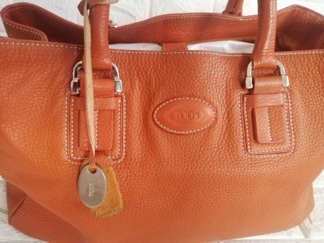 Tod's Vintage Leather Shoulder Bag (Category: Luxury Bags & Wallets) located in Las Pinas. Submitted by etoksi1234 (Listing ID 1087175887, Image 2). Description: Pre-loved TOD'S vintage bag... Last pic for reference only of the price... Minimal signs of usage... Magnetic Closure... Size: L-14" X H-9" x D-6" Please manage your expectations. All sales are final. Kindly examine pictures carefully when buying online. No return, exchange policy....